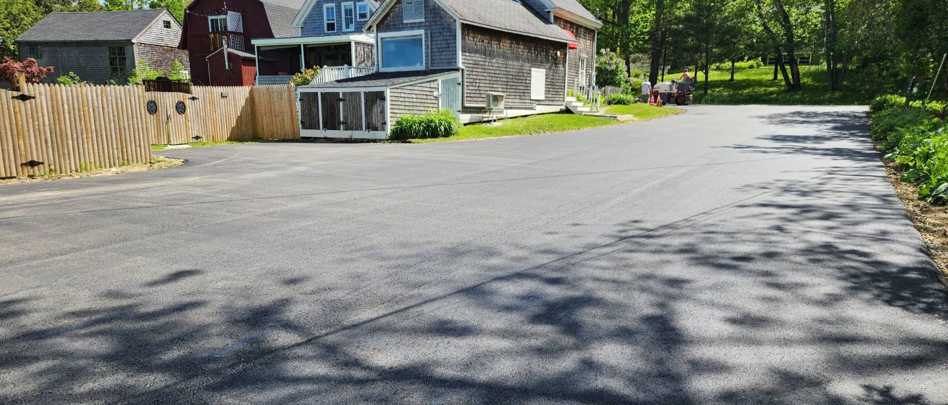 Finished driveway in front of the houses