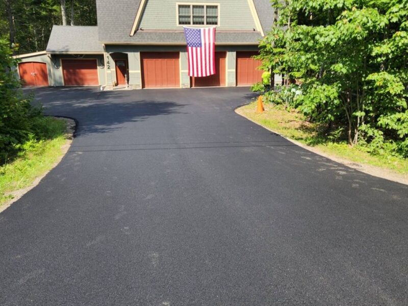 Finished driveway to a garage