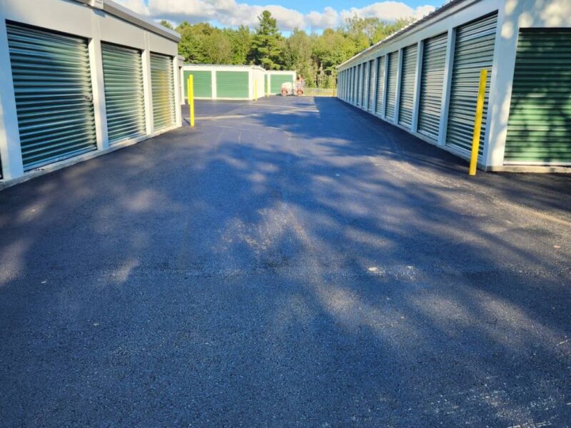 Paved lane between storage units